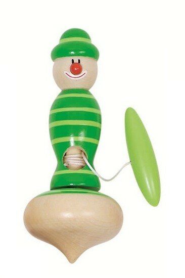 Wooden toy figure of a snowman with green striped shirt and hat on a white background