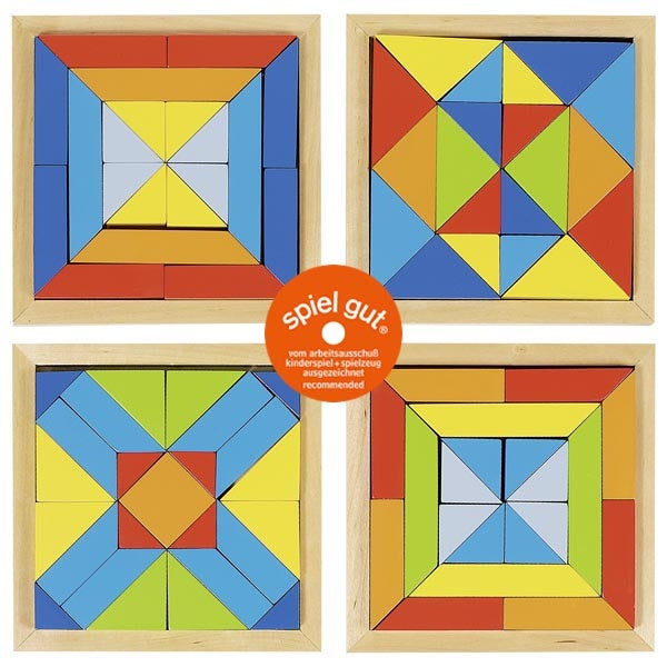 Colorful geometric wooden puzzle with 'Spiel gut' label