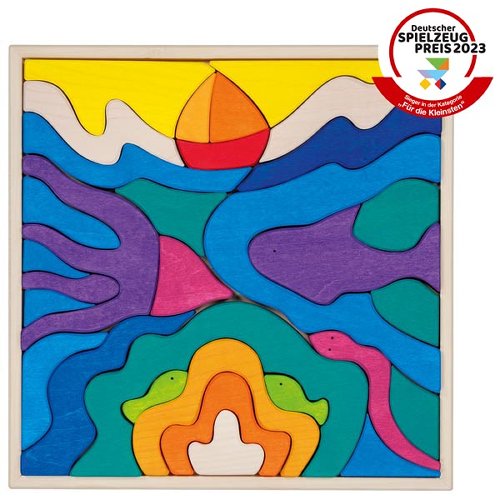 Colorful wooden puzzle with a sunset and sea design, featuring the Deutscher Spielzeug Preis 2023 award on a white background.