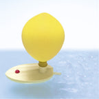 Yellow buoy with a red button on a white background