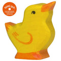 Yellow wooden chick toy with orange beak and feet, branded 'spiel gut' on a white background.