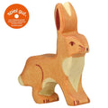 Wooden rabbit toy with 'spiel gut' logo on a white background