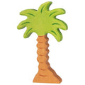 Wooden palm tree toy on a white background