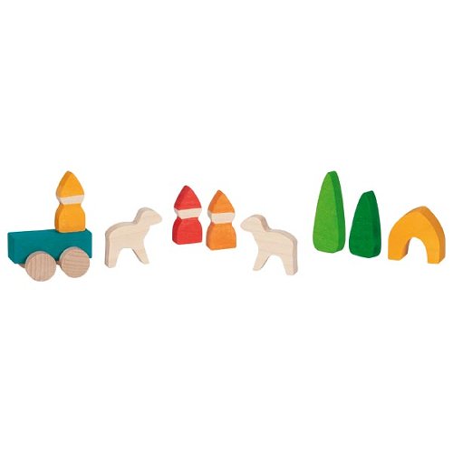 Set of colourful wooden toys including a truck, sheep, and trees on a white background