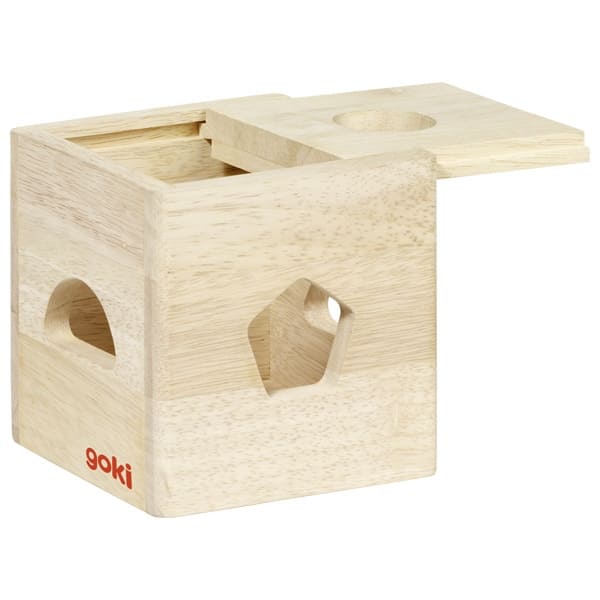 Wooden toy block with holes on a white background, featuring the brand 'goki'.
