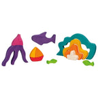 Colorful wooden toy set with sea creatures on a white background