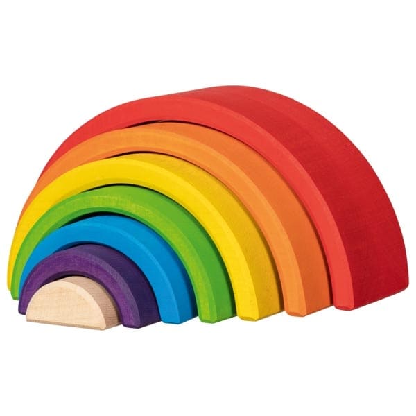 Set of colorful wooden rainbow blocks on a white background