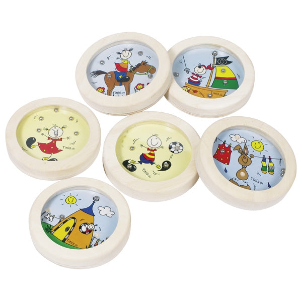 Small round pinball game with colorful cartoon designs on a white background