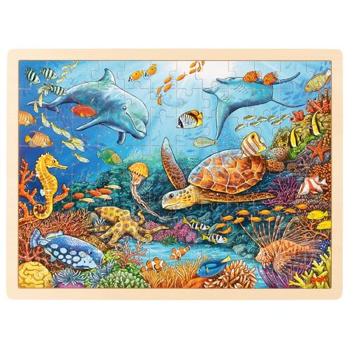 Colorful underwater scene puzzle with dolphins, turtles, and various sea creatures on a white background.