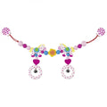Colorful beaded pram chain with heart and horse charms on a white background