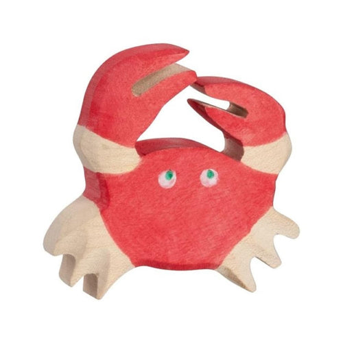 Wooden toy crab on a white background
