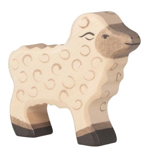 Wooden sheep toy on a white background